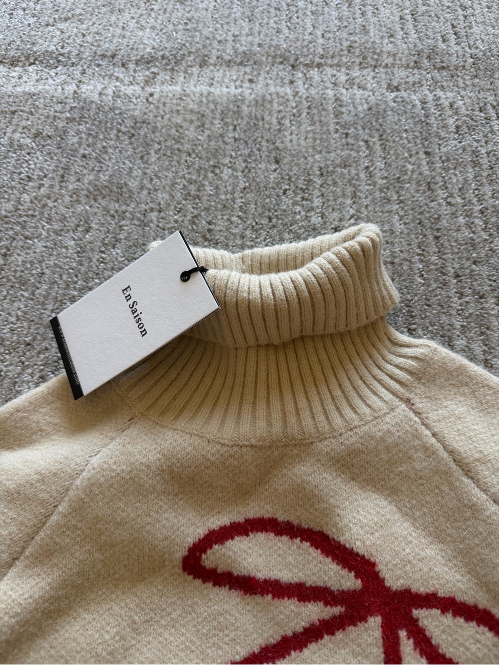 En Saison Cream Turtleneck Sweater with Red Bow Accent - Picture 2 of 3